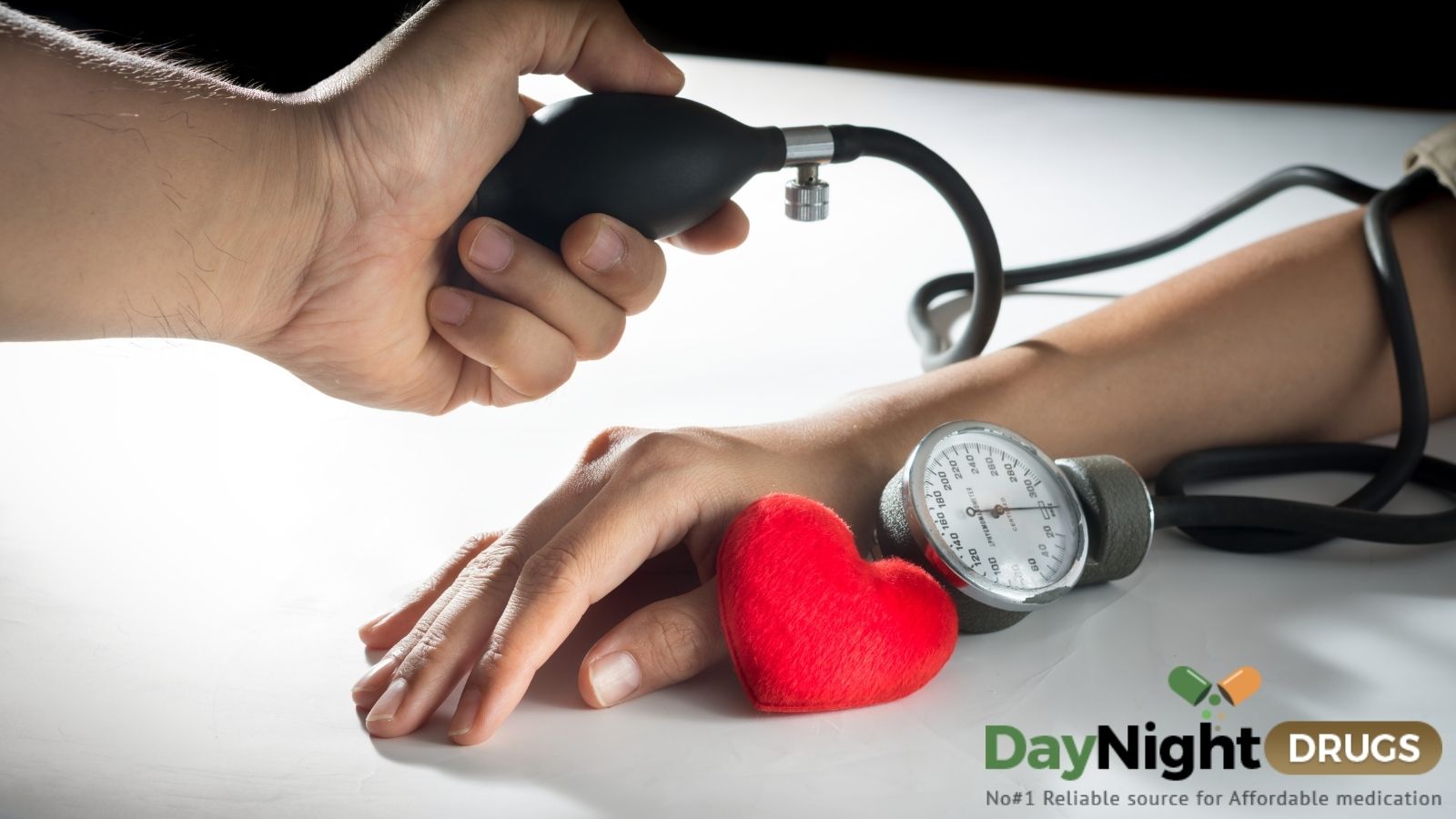 A doctor measuring blood pressure of a patient using  a sphygmomanometer