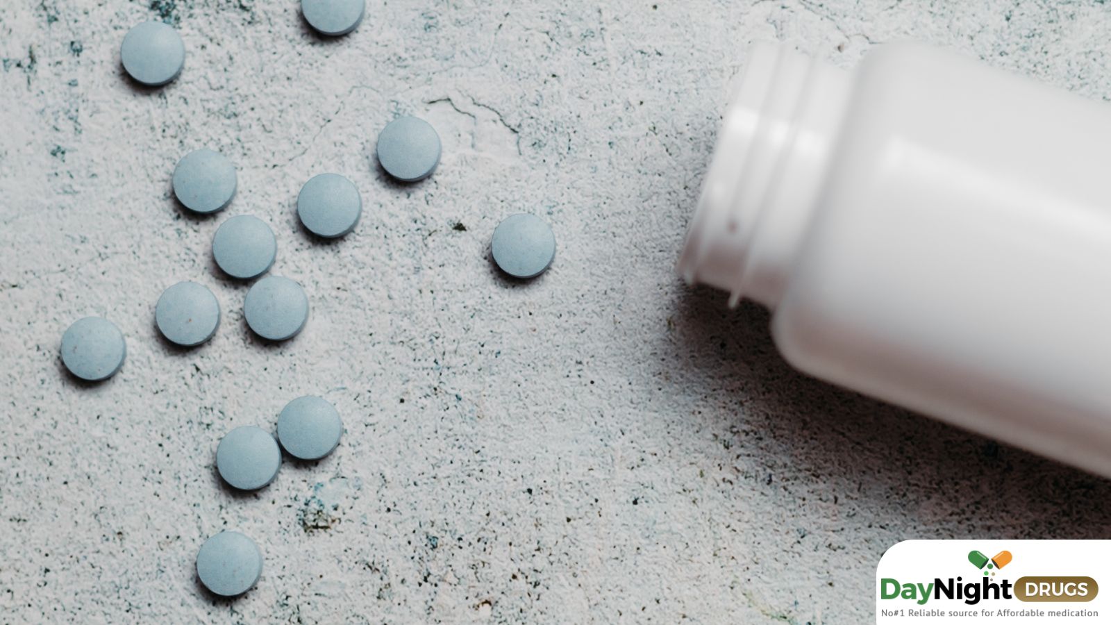 Bottle and spilled pills on a surface