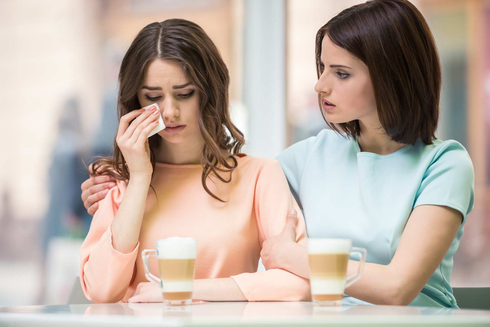 Woman consoling the other woman