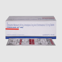 A box and a strip of  Olmesartan Medoxomil (40mg) + Amlodipine (5mg) + Chlorthalidone (6.25mg) Tabs