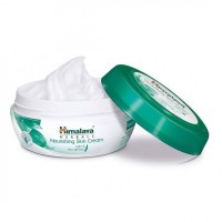 An open jar of himalaya's Nourishing Skin Cream 100 ml 