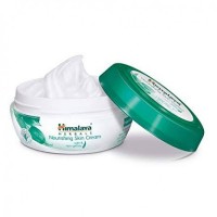 An open jar of himalaya's Nourishing Skin Cream 200 ml Jar